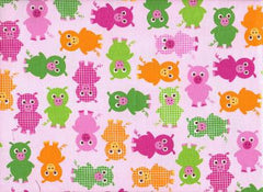 Urban Zoologie Kaufman Green & Orange Pig Fabric 1/2 Metre